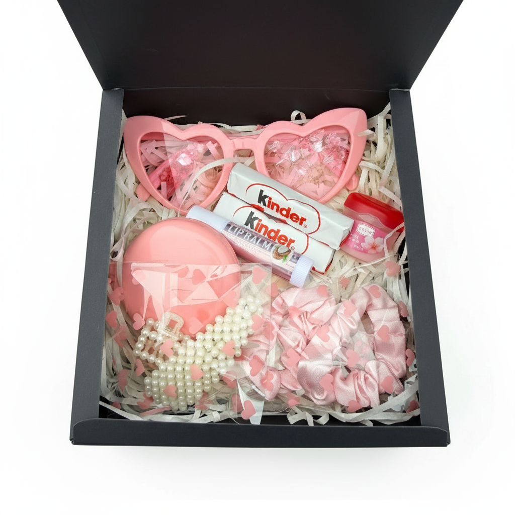 Pinky Box — luxury gift box with pink heart sunglasses, Kinder chocolate, coconut lip balm, cherry blossom lip moisturiser, satin scrunchie, pearl hair clip and compact mirror