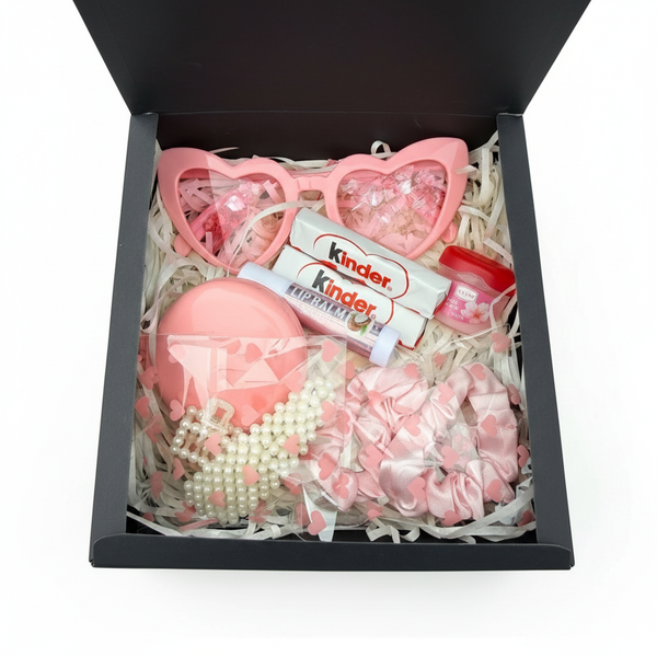 Pinky Box — luxury gift box with pink heart sunglasses, Kinder chocolate, coconut lip balm, cherry blossom lip moisturiser, satin scrunchie, pearl hair clip and compact mirror